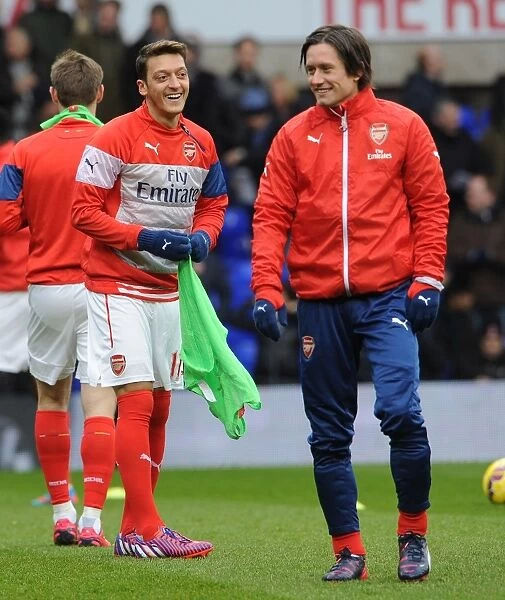 Arsenal Players Mesut Ozil and Tomas Rosicky Warming Up Ahead of Tottenham Clash (2014-15)