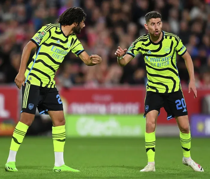 Framed Print : Arsenal Players Mohamed Elneny and Jorginho Strategize during Brentford vs Arsenal Carabao Cup Match, 2023-24