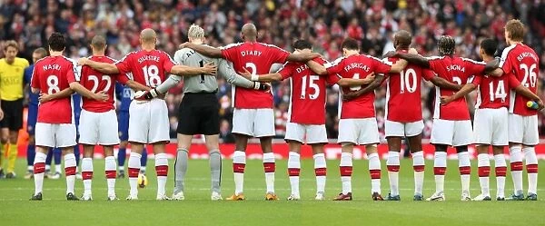 The Arsenal players observe a minutes silence for Remembrance Sunday