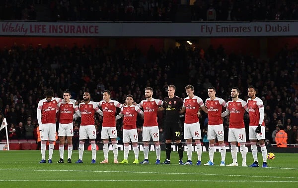 Arsenal Players Observing Minutes Silence Before Arsenal v Wolverhampton Wanderers, Premier League 2018-19