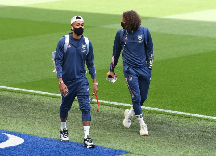Framed Print : Arsenal Players Pierre-Emerick Aubameyang and Matteo Guendouzi Arrive at Brighton & Hove Albion Stadium for Premier League Match (2020)