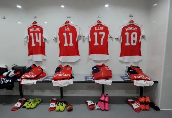 Framed Print : Arsenal Players Prepare for Battle: Tottenham Showdown in Capital One Cup