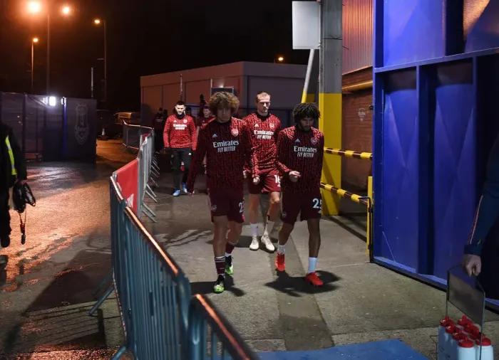 Framed Print : Arsenal Players Prepare for Everton Clash: Warm-Up at Goodison Park