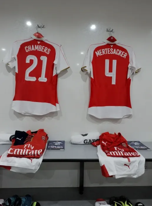 Framed Print : Arsenal Players Prepare for Tottenham Showdown in Capital One Cup: A Glimpse into the Arsenal Dressing Room