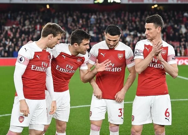 Arsenal Players Sokratis, Koscielny, Kolasinac, and Monreal Prepare for Arsenal v Bournemouth (2018-19)