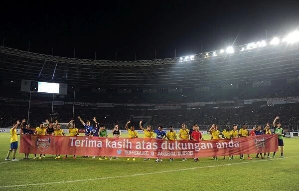 Arsenal Players Thank Fans with Banner at Indonesia All-Stars Match, 2013