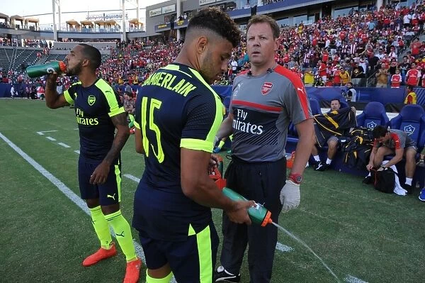 Arsenal Players Theo Walcott and Alex Oxlade-Chamberlain with Physio Colin Lewin - Pre-Match Preparation (Arsenal vs Chivas, 2016)