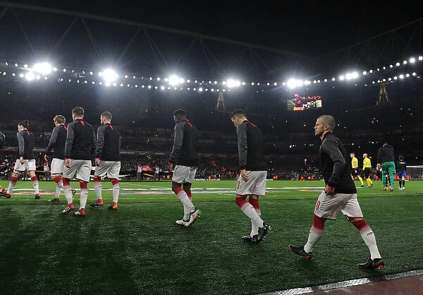Arsenal Players Walk Out Before Arsenal vs AC Milan Europa League Clash at Emirates Stadium