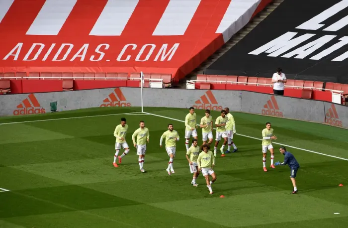 Framed Print : Arsenal Players Warm Up Ahead of Arsenal FC vs Norwich City Premier League Clash at Emirates Stadium