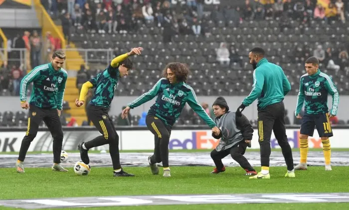 Framed Print : Arsenal Players Warm Up Ahead of Vitoria Guimaraes Clash in Europa League Framed Print : Arsenal Players Warm Up Ahead of Vitoria Guimaraes Clash in Europa League