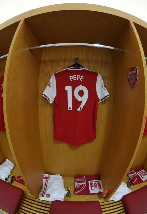Framed Print : Arsenal: Pre-Match Room - Arsenal FC vs Burnley FC, Premier League (Nicolas Pepe's Jersey on Display)