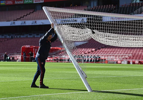 Arsenal Prepares for Crystal Palace: Setting Up the North Bank Goal at Emirates Stadium
