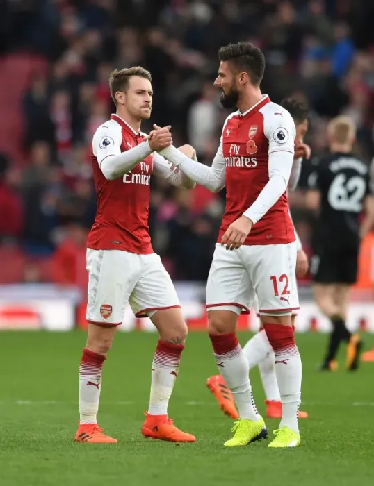 Framed Print : Arsenal: Ramsey and Giroud Share a Moment after Arsenal's Victory over Swansea City