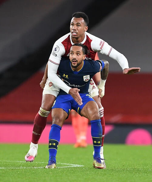 Arsenal Rivals Go Head-to-Head: Gabriel vs Walcott in Empty Emirates