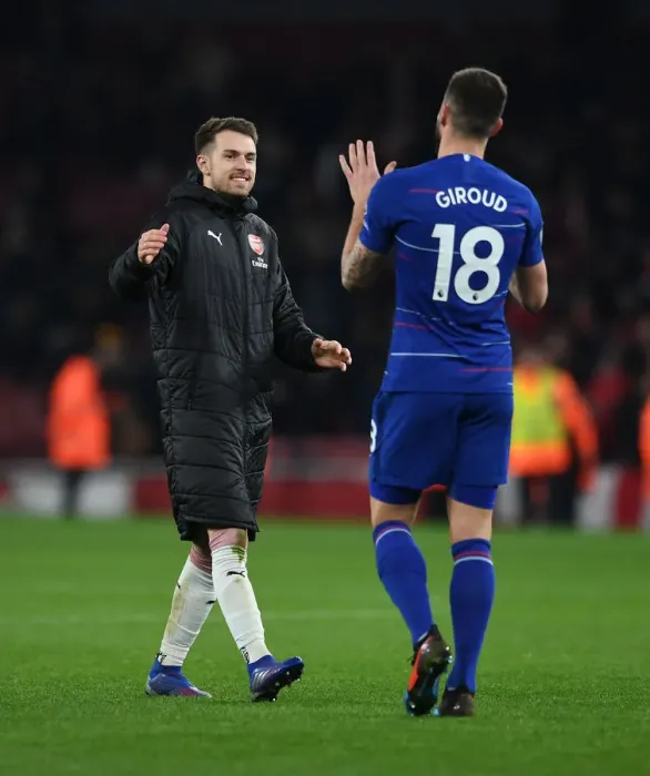 Framed Print : Arsenal Rivals Turned Teammates: Ramsey and Giroud's Unity After Intense Arsenal vs. Chelsea Clash (2018-19) Framed Print : Arsenal Rivals Turned Teammates: Ramsey and Giroud's Unity After Intense Arsenal vs. Chelsea Clash (2018-19)