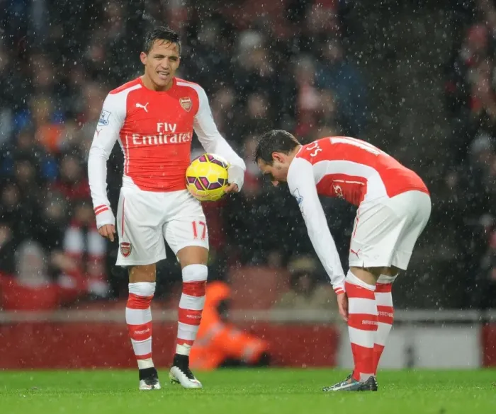 Framed Print : Arsenal: Sanchez Asks Cazorla for Penalty Duty vs. Queens Park Rangers (2014-15)