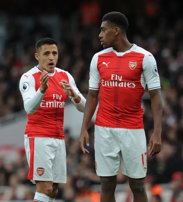 Framed Print : Arsenal: Sanchez and Iwobi in Deep Conversation during Arsenal v Middlesbrough Match Framed Print : Arsenal: Sanchez and Iwobi in Deep Conversation during Arsenal v Middlesbrough Match