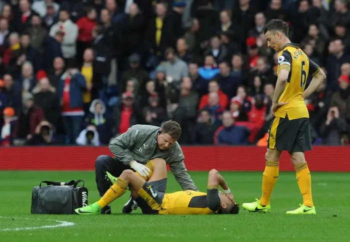 Framed Print : Arsenal: Sanchez Receives Treatment as Koscielny Looks On During West Bromwich Albion Match