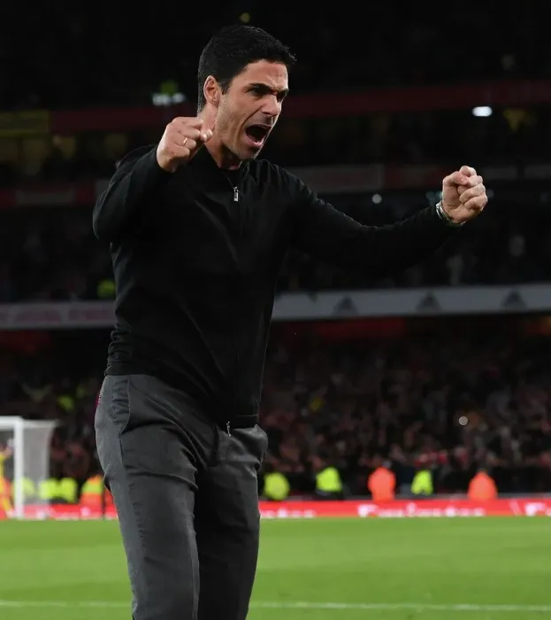Framed Print : Arsenal Secure Hard-Fought Victory Over Liverpool: Mikel Arteta's Emotional Celebration