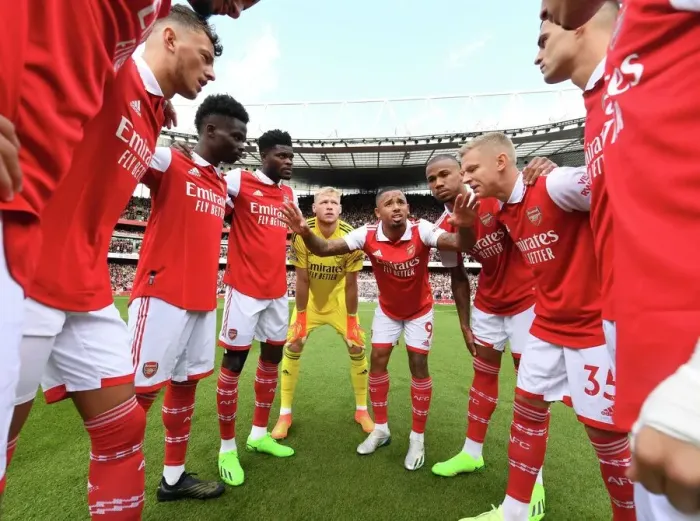 Framed Print : Arsenal Squad Unites: A Powerful Display of Team Spirit Against Tottenham in the Premier League 2022-23