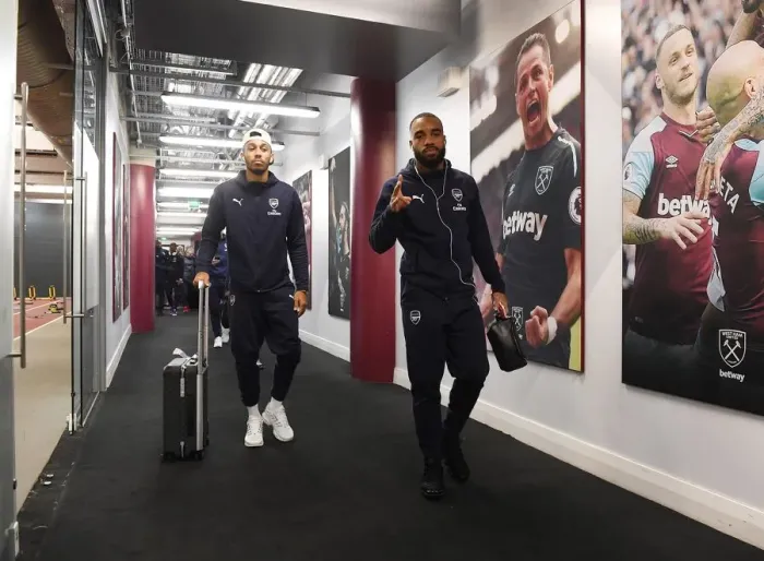 Framed Print : Arsenal Stars Aubameyang and Lacazette Head to Changing Room before West Ham Clash (2018-19) Framed Print : Arsenal Stars Aubameyang and Lacazette Head to Changing Room before West Ham Clash (2018-19)