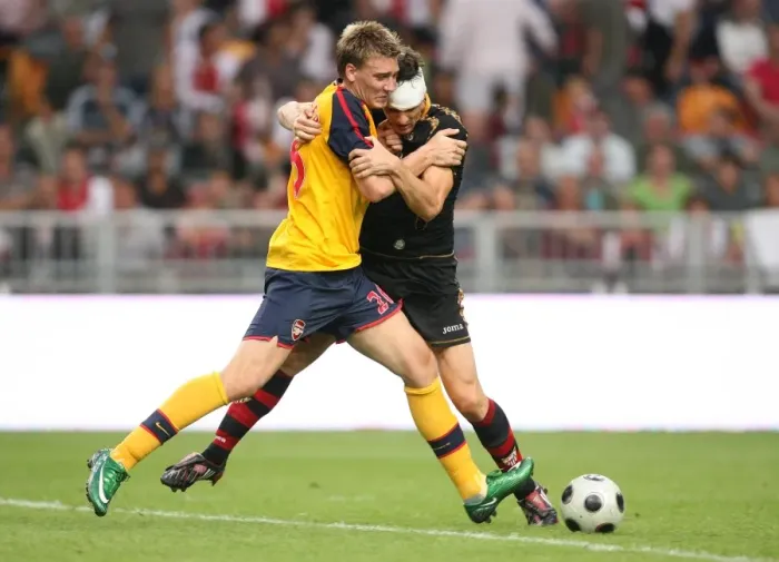 Framed Print : Arsenal Stars: Bendtner and Squillaci Face Off in Amsterdam Tournament Framed Print : Arsenal Stars: Bendtner and Squillaci Face Off in Amsterdam Tournament