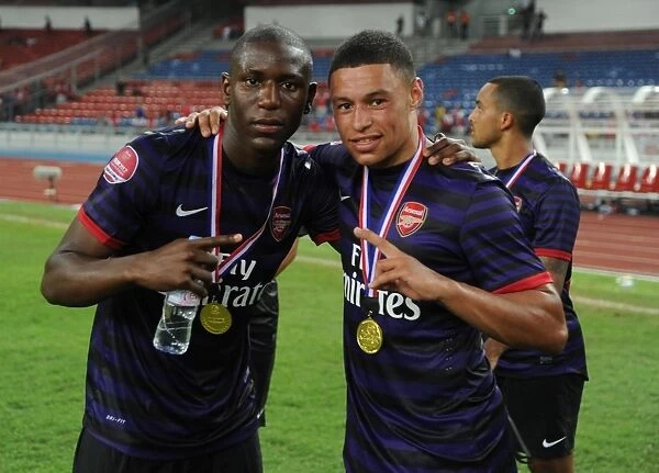 Arsenal Stars Benik Afobe and Alex Oxlade-Chamberlain Celebrating Post-Match Victory (Malaysia XI vs Arsenal, 2012)