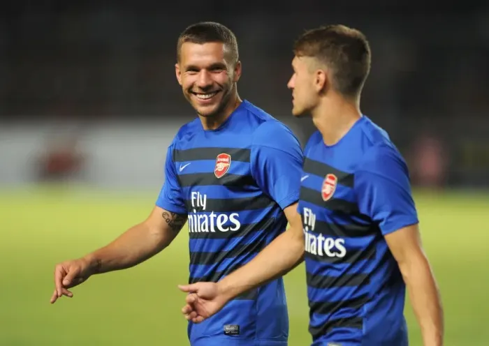 Framed Print : Arsenal Stars: Lukas Podolski and Aaron Ramsey Pre-Match Chat with Indonesia All-Stars (2013)