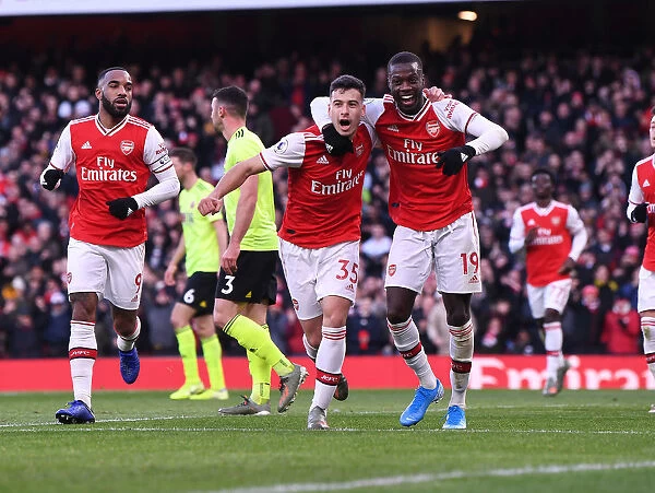 Arsenal Stars Martinelli and Pepe: Celebrating a Goal Against Sheffield United (2019-20)