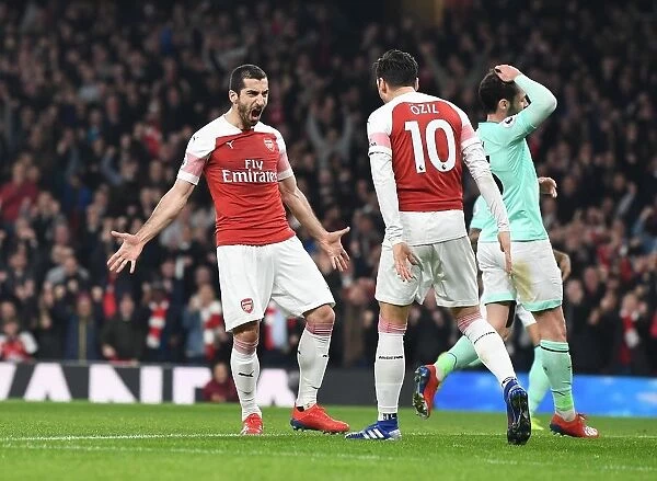 Arsenal Stars Mkhitaryan and Ozil Celebrate Goals Against Bournemouth in 2018-19 Premier League