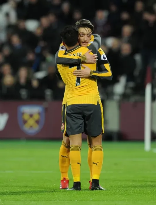 Framed Print : Arsenal Stars: Ozil and Sanchez Celebrate Goal vs. West Ham United, 2016-17 Framed Print : Arsenal Stars: Ozil and Sanchez Celebrate Goal vs. West Ham United, 2016-17