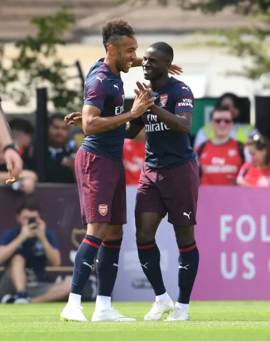 Framed Print : Arsenal Stars Pierre-Emerick Aubameyang and Jordi Osei-Tutu in Pre-Season Friendly against Borehamwood