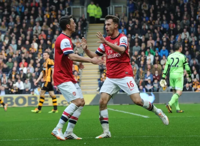 Framed Print : Arsenal Stars: Ramsey and Ozil Celebrate Goal in Hull City Victory, Premier League 2013-14