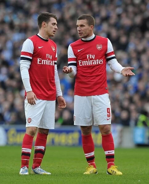 Arsenal Stars Ramsey and Podolski in FA Cup Clash against Brighton & Hove Albion