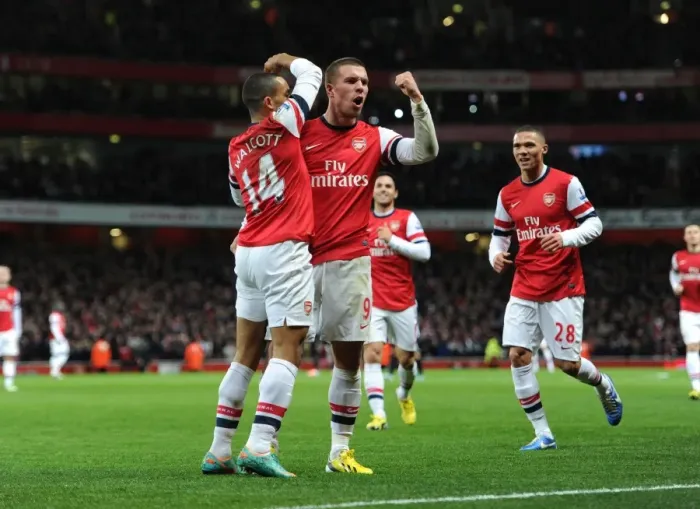 Framed Print : Arsenal Stars: Walcott and Podolski Celebrate First Goal Against Newcastle United (2012-13) Framed Print : Arsenal Stars: Walcott and Podolski Celebrate First Goal Against Newcastle United (2012-13)