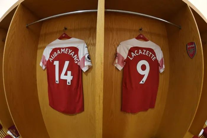 Framed Print : Arsenal Strikers Aubameyang and Lacazette: Preparing for Battle in the Arsenal Changing Room (2018-19) Framed Print : Arsenal Strikers Aubameyang and Lacazette: Preparing for Battle in the Arsenal Changing Room (2018-19)