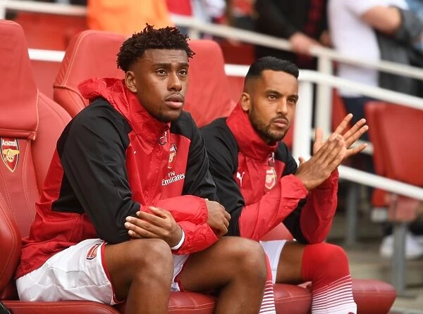 Arsenal Substitutes: Alex Iwobi and Theo Walcott Before Arsenal v AFC Bournemouth, Premier League 2017-18