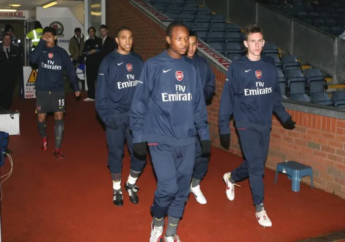 Framed Print : Arsenal Substitutes: Gavin Hoyte, Mark Randall, Theo Walcott, and Gael Clichy Prepare for FA Cup Clash against Blackburn Rovers, 2007 Framed Print : Arsenal Substitutes: Gavin Hoyte, Mark Randall, Theo Walcott, and Gael Clichy Prepare for FA Cup Clash against Blackburn Rovers, 2007
