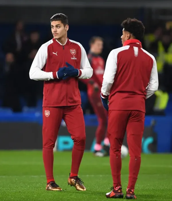 Framed Print : Arsenal Substitutes Mavropano and Nelson Warm Up Ahead of Chelsea Showdown - Carabao Cup Semi-Final