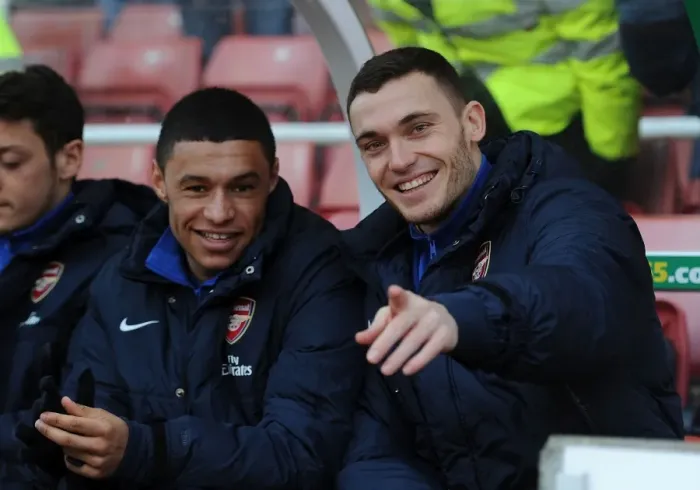 Framed Print : Arsenal Substitutes Oxlade-Chamberlain and Vermaelen Gear Up for Stoke City Battle Framed Print : Arsenal Substitutes Oxlade-Chamberlain and Vermaelen Gear Up for Stoke City Battle
