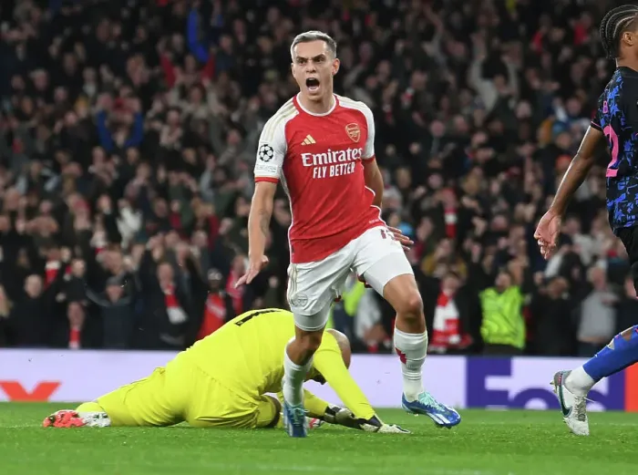 Framed Print : Arsenal Takes the Lead: Leandro Trossard Scores First Goal Against Sevilla in 2023-24 UEFA Champions League