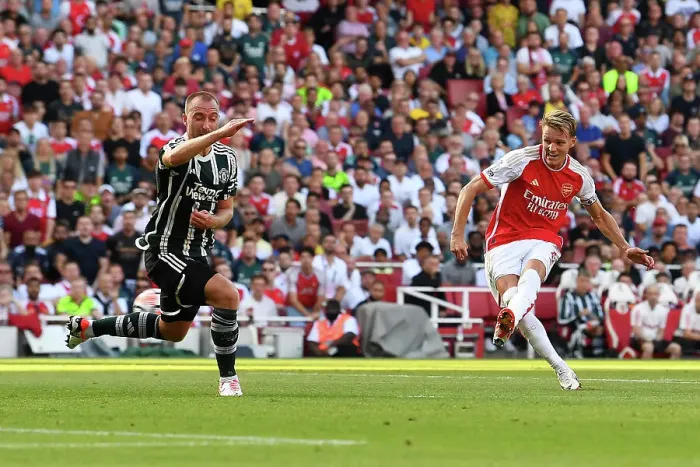 Framed Print : Arsenal Takes the Lead: Martin Ødegaard Scores First Goal Against Manchester United (2023-24)