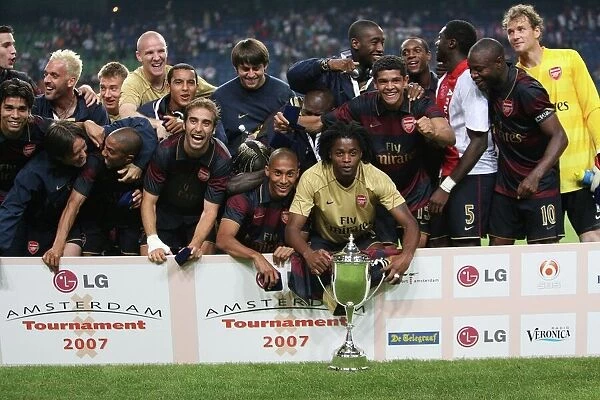 The Arsenal team celebrate winning the Amsterdam tournament