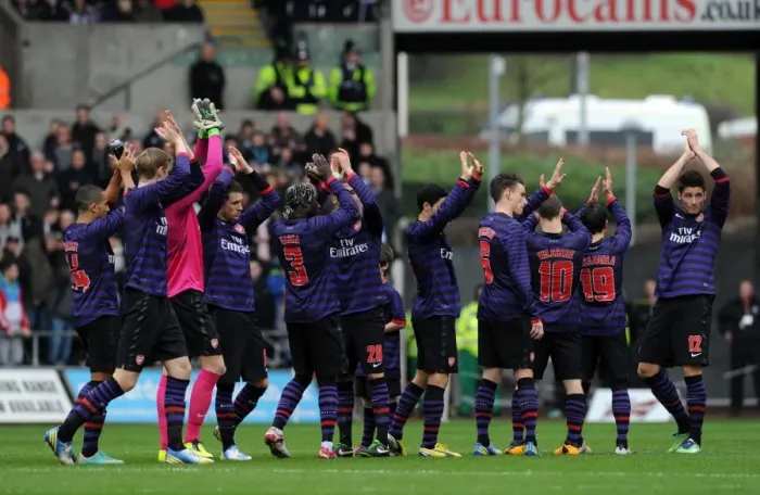 Framed Print : The Arsenal Team clap the fans before the match. Swansea 2: 2 Arsenal. FA Cup 3rd Round