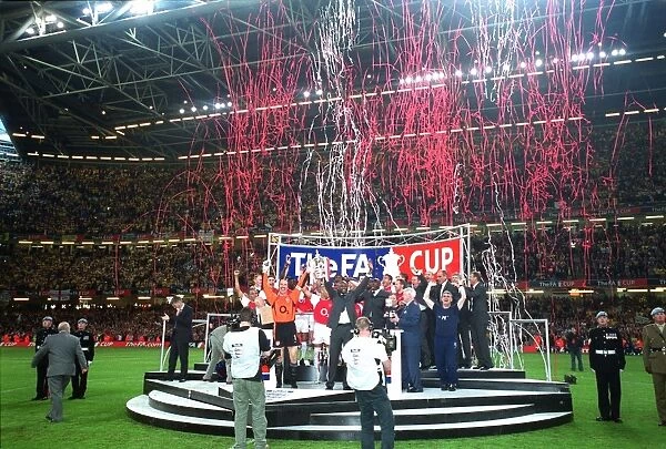 The Arsenal team lift the FA Cup