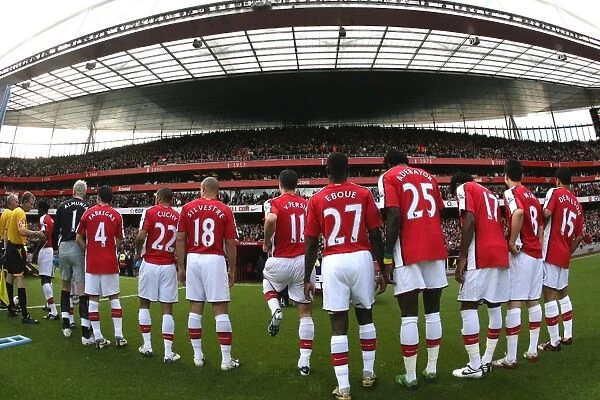The Arsenal team line up before the match