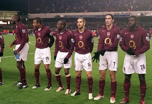 The Arsenal team lines up before the match