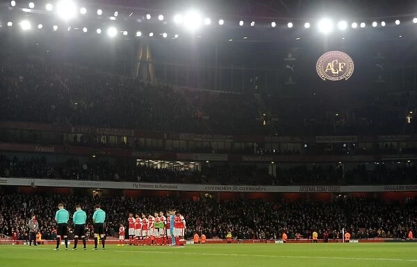 Arsenal team during a minutes silence for the Brazilian football team Chapecoense
