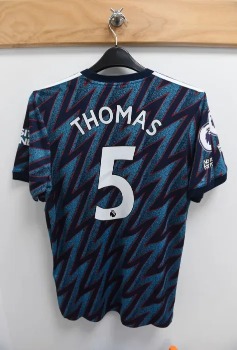 Framed Print : Arsenal: Thomas Partey's Shirt in Arsenal Changing Room Before Wolverhampton Wanderers Clash (Premier League 2021-22)
