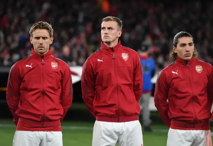 Framed Print : Arsenal Trio: Monreal, Holding, Bellerin Pre-Match Huddle vs. 1. FC Koeln (UEFA Europa League, 2017)